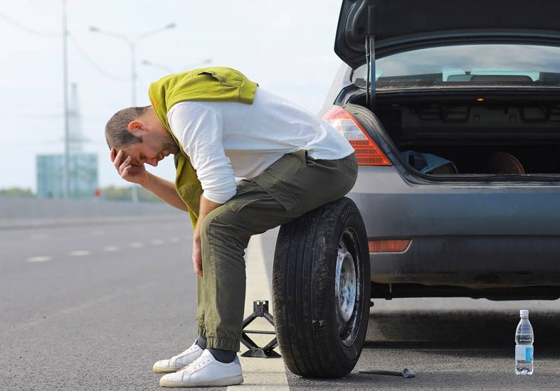 Man changing his tyre